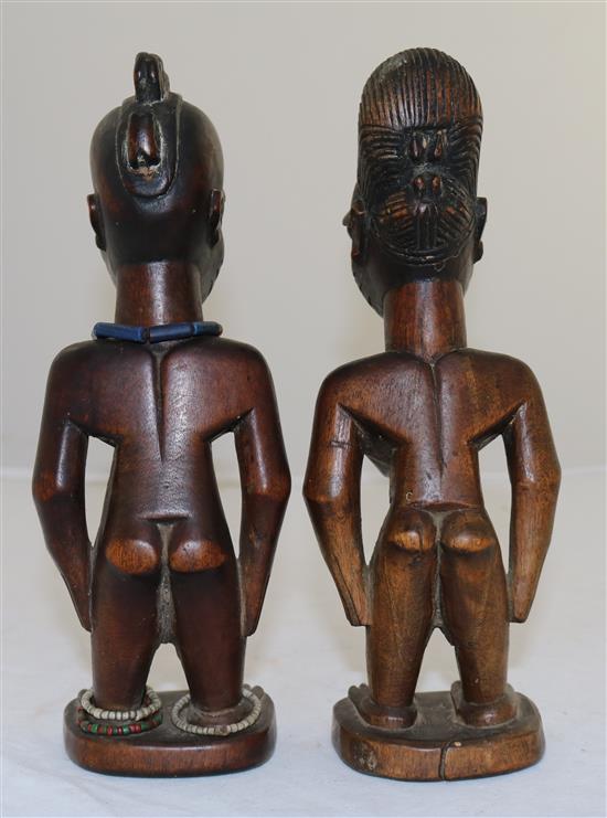 Two Yoruba wood figures of a man and a woman, late 19th/early 20th century, 9in.